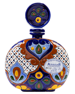 Image of a bottle of Azulejos Añejo Talavera Tequila, its cermamic bottle design features colors of blue, red, yellow, green, and white.