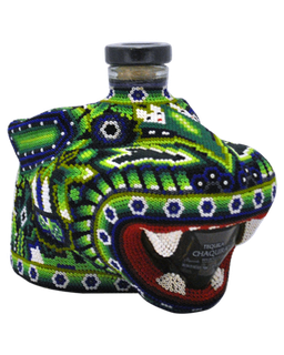 Image of a bottle of Chaquira Reposado Tequila with its colorful jaguar deign, featuring colors of green, blue, white, and red.