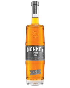 Image of a bottle of Monkey Spiced Rum featuring a sleek design with a grey label and white accents.