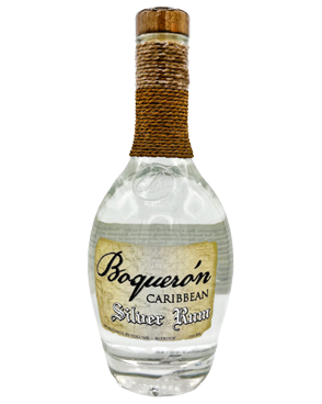 Image of a bottle of Boquerón Silver Rum featuring a sleek design with an aged white label and silver and black accents.