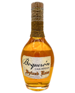 Image of a bottle of Boquerón Spiced Rum featuring a sleek design with an aged white label and orange and black accents.