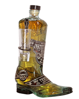 Image of a bottle of The Texano Boot Tequila, in the shape of a cowboy boot black label and white accents.