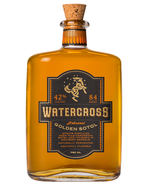 Image of a bottle of Watercross Golden Sotol Mezcal featuring a sleek design with a black label and gold and orange accents.