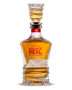 Image of a bottle of Dinastía Real Reposado Tequila, featuring a sleek design with a clear label and red accents.