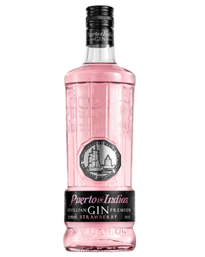 Image of a pink bottle of Puerto de Indias Strawberry Gin featuring a sleek design with a silver stamp logo, black label and pink and white accents.